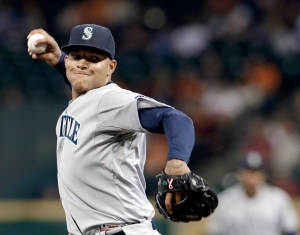 Seattle Mariners' Taijuan Walker delivers a pitch against the Houston Astros in the first inning of a baseball game Friday, Sept. 19, 2014, in Houston. (AP Photo/Pat Sullivan)